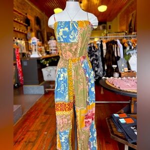 Free People Retro Heat Wave Romper: playful, and perfect for any adventure!